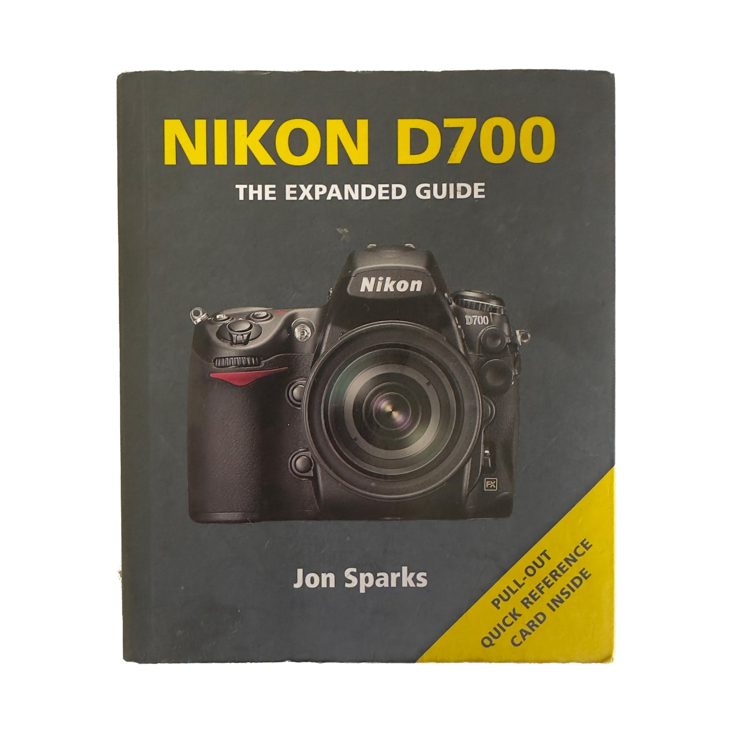 Book titled 'Nikon D700: The Expanded Guide' by Jon Sparks with a Nikon camera on the cover.