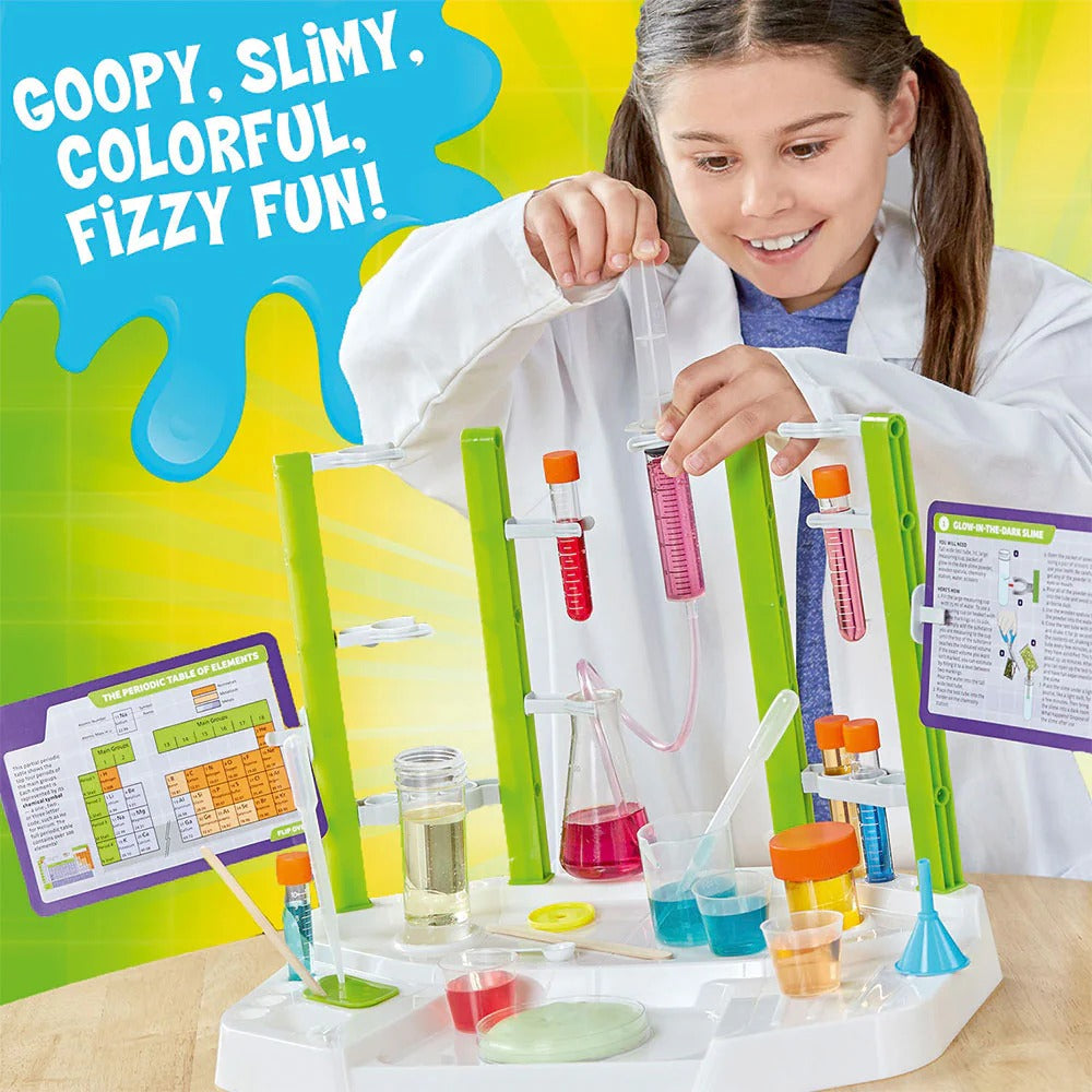 Child in a lab coat with a science experiment set, surrounded by colorful text and a bright background.