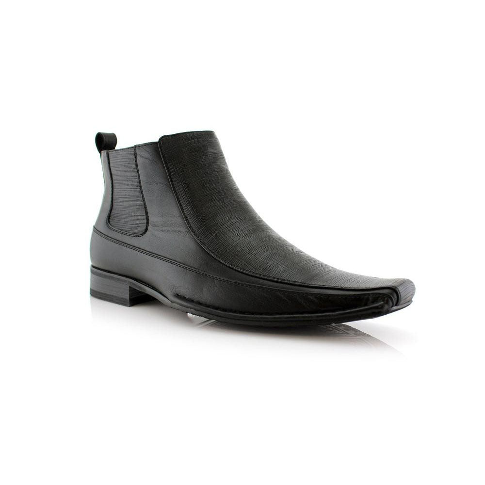 Side view showcasing the zip-up feature of the black leather boots