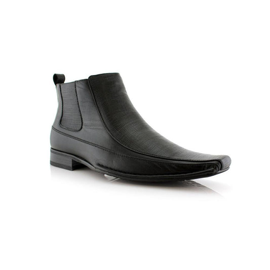 Side view showcasing the zip-up feature of the black leather boots